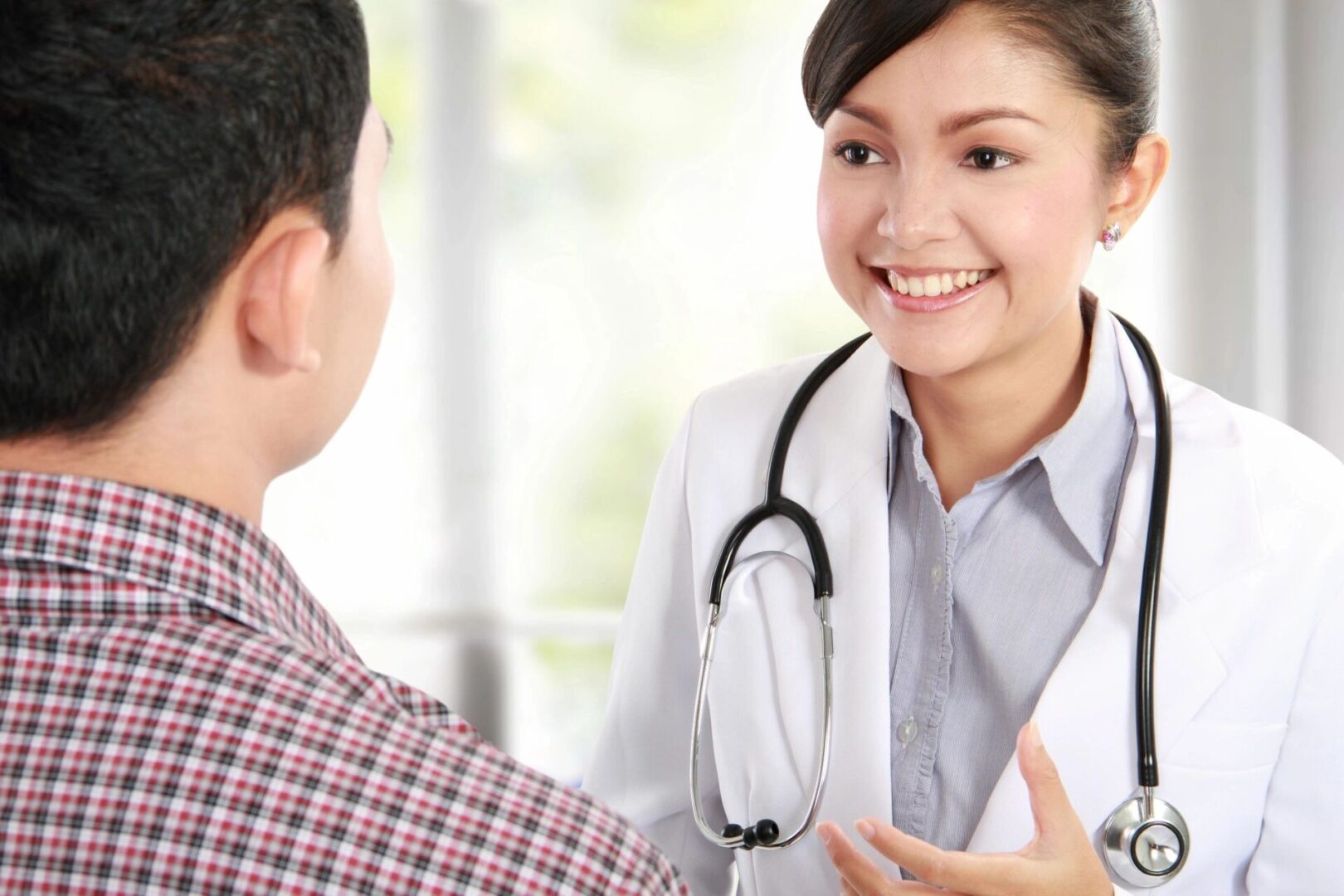 A doctor providing professional general medicine care to a patient.